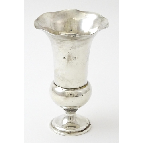 357 - A silver spill vase hallmarked London 1911, maker William Comyns & Sons Ltd. Approx. 4