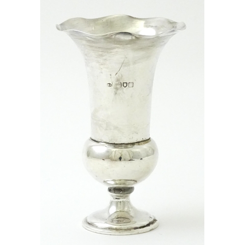 357 - A silver spill vase hallmarked London 1911, maker William Comyns & Sons Ltd. Approx. 4