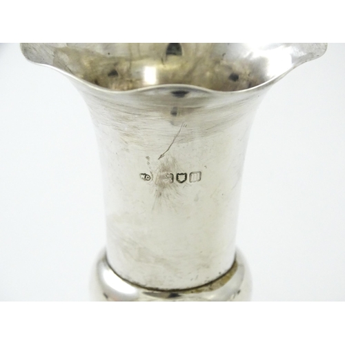 357 - A silver spill vase hallmarked London 1911, maker William Comyns & Sons Ltd. Approx. 4