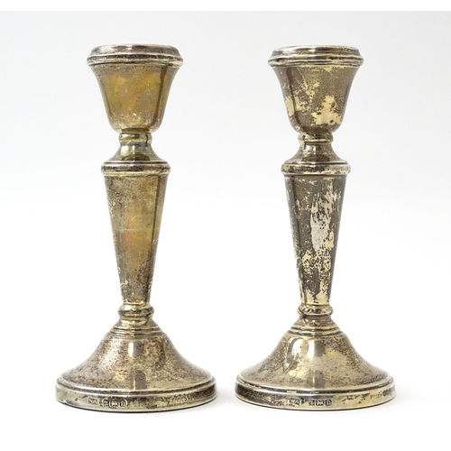 361 - A pair of small silver candlesticks hallmarked Birmingham 1978, maker William Adams Ltd. Approx. 5