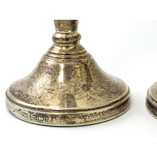 361 - A pair of small silver candlesticks hallmarked Birmingham 1978, maker William Adams Ltd. Approx. 5