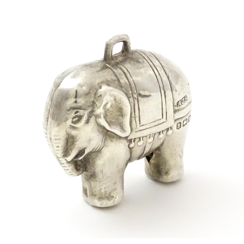 368 - A silver baby's rattle of elephant form, hallmarked Birmingham 1921, maker Arthur Johnson Smith. App... 