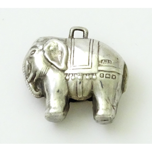 368 - A silver baby's rattle of elephant form, hallmarked Birmingham 1921, maker Arthur Johnson Smith. App... 