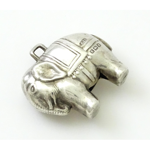 368 - A silver baby's rattle of elephant form, hallmarked Birmingham 1921, maker Arthur Johnson Smith. App... 