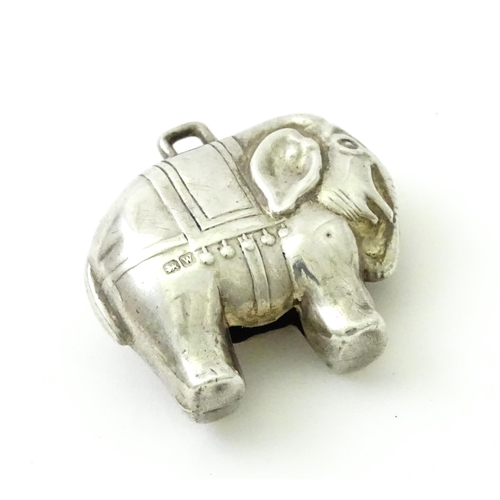 368 - A silver baby's rattle of elephant form, hallmarked Birmingham 1921, maker Arthur Johnson Smith. App... 