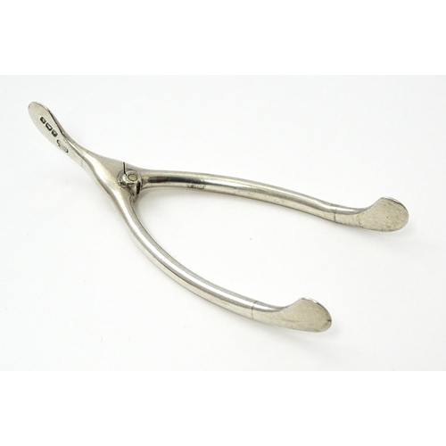 370 - Novelty silver sugar tongs of wishbone form, hallmarked Birmingham1922, maker William Hutton & Sons ... 