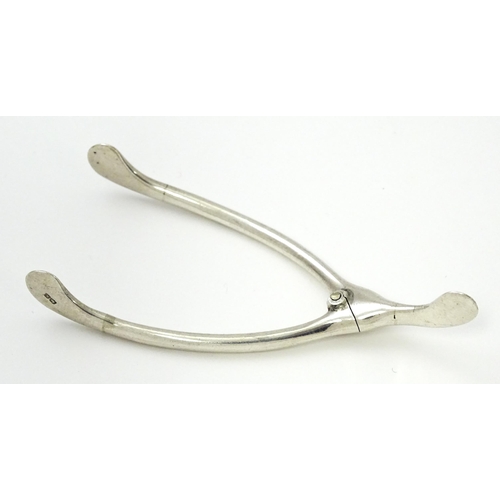 370 - Novelty silver sugar tongs of wishbone form, hallmarked Birmingham1922, maker William Hutton & Sons ... 