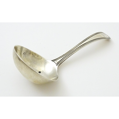 373 - A silver caddy spoon of ladle form hallmarked London 1794. Approx. 3 1/2