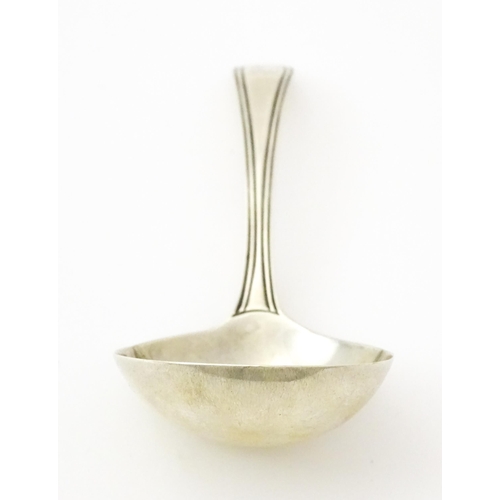 373 - A silver caddy spoon of ladle form hallmarked London 1794. Approx. 3 1/2