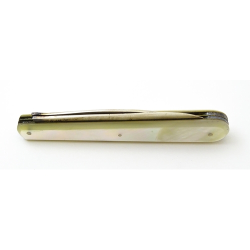 378 - A Victorian silver twin blade folding fruit knife with mother of pearl handle hallmarked Sheffield 1... 