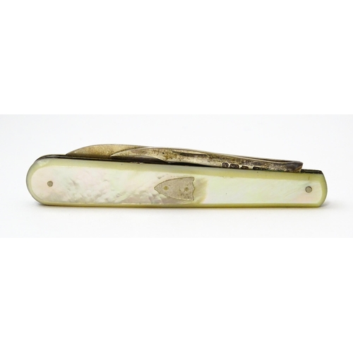 378 - A Victorian silver twin blade folding fruit knife with mother of pearl handle hallmarked Sheffield 1... 