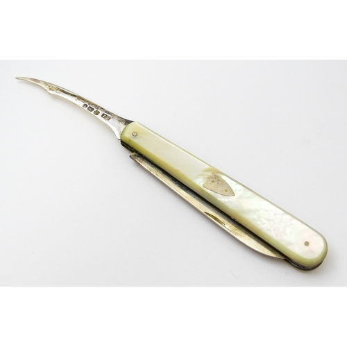 378 - A Victorian silver twin blade folding fruit knife with mother of pearl handle hallmarked Sheffield 1... 