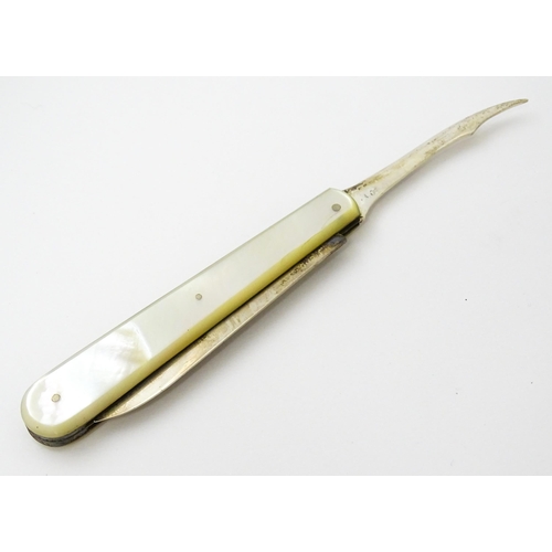 378 - A Victorian silver twin blade folding fruit knife with mother of pearl handle hallmarked Sheffield 1... 