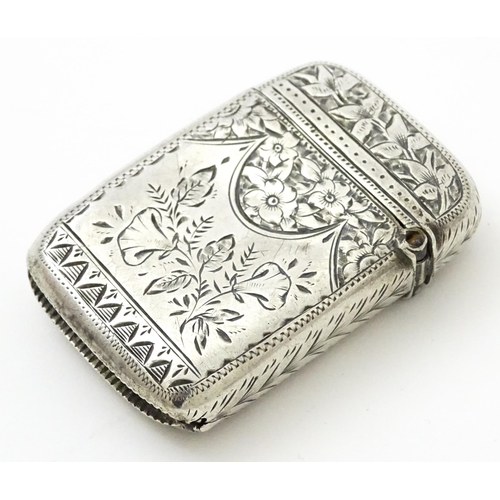 383 - A Victorian silver vesta case with engraved acanthus scroll decoration, hallmarked Birmingham 1890, ... 