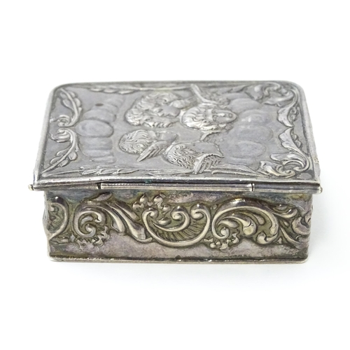 390 - A silver box of book form with embossed angel detail hallmarked Birmingham 1976, maker Richards & Kn... 