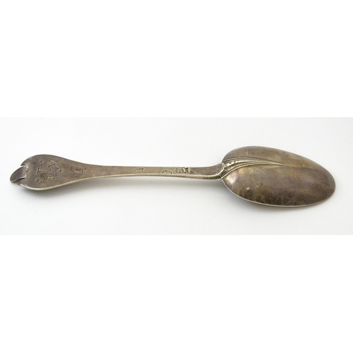 394 - An early 18thC silver trefid spoon with rat tail bowl, maker IC possibly Jonah Clifton. Approx. 8