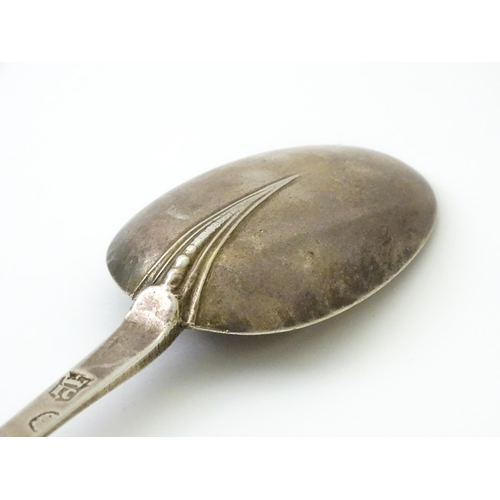 394 - An early 18thC silver trefid spoon with rat tail bowl, maker IC possibly Jonah Clifton. Approx. 8