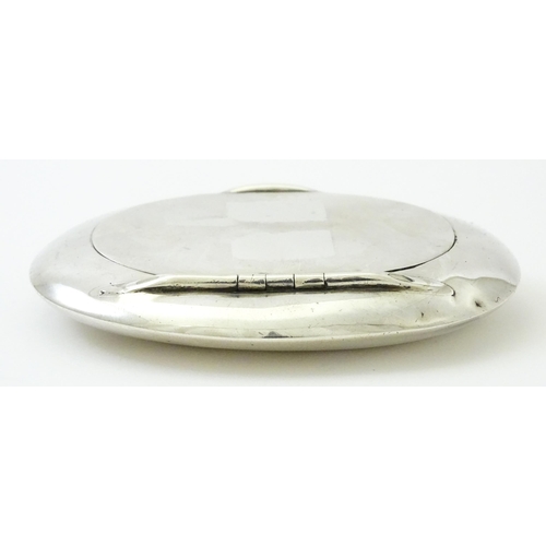 402 - A silver snuff / tobacco box of oval form hallmarked Birmingham 1905, maker Constantine & Floyd Ltd.... 