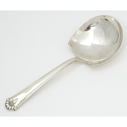 454 - A silver caddy spoon hallmarked Sheffield 1958, maker Cooper Brothers & Sons Ltd. Approx. 3 1/2