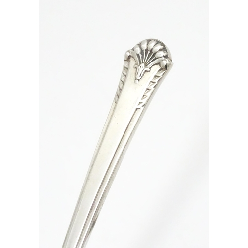 454 - A silver caddy spoon hallmarked Sheffield 1958, maker Cooper Brothers & Sons Ltd. Approx. 3 1/2