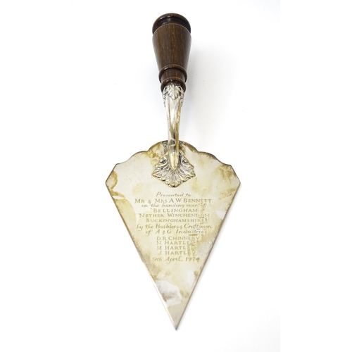 466 - A cased silver presentation trowel with engraved inscription 'Presented to Mr & Mrs A. W. Bennett on... 