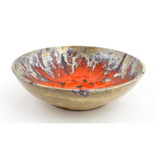 166 - A French Vallauris pottery bowl with Fat Lava style decoration. Marked under. Approx. 8