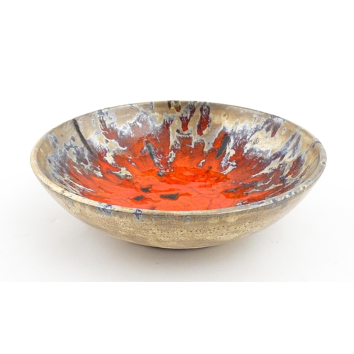 166 - A French Vallauris pottery bowl with Fat Lava style decoration. Marked under. Approx. 8