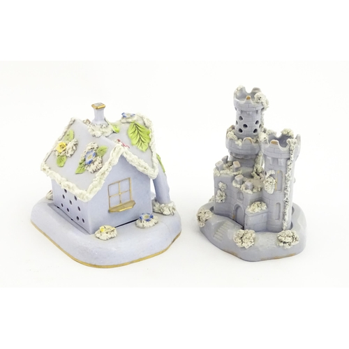 58 - Two 19thC lilac pastille burners, one modelled as a castle with castellated turrets, the other model... 