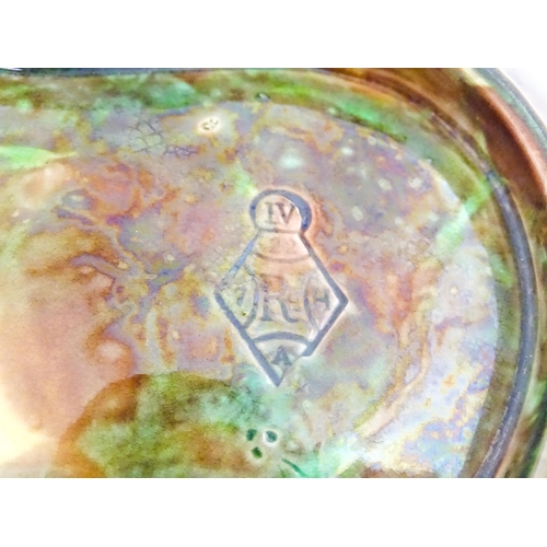 94 - A Victorian George Jones style majolica dish of leaf form with a squirrel seated on a branch, marked... 