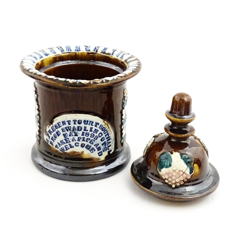 222 - A Victorian Measham bargeware tobacco pot and cover, bearing a plaque titled A Present to Mr T Sooth... 