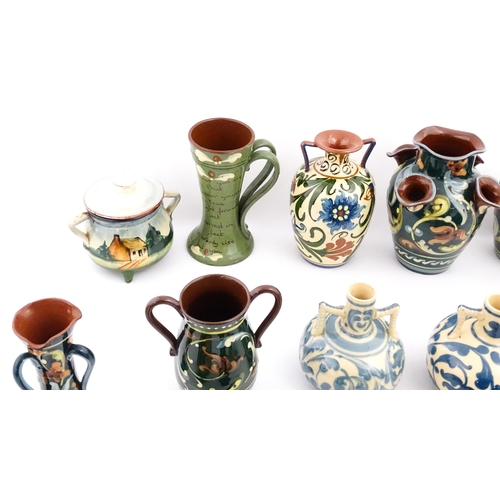 251 - A quantity of assorted Devon ceramics to include Allervale Pottery vases and jugs decorated with flo... 