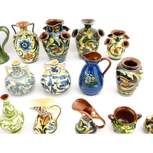 251 - A quantity of assorted Devon ceramics to include Allervale Pottery vases and jugs decorated with flo... 