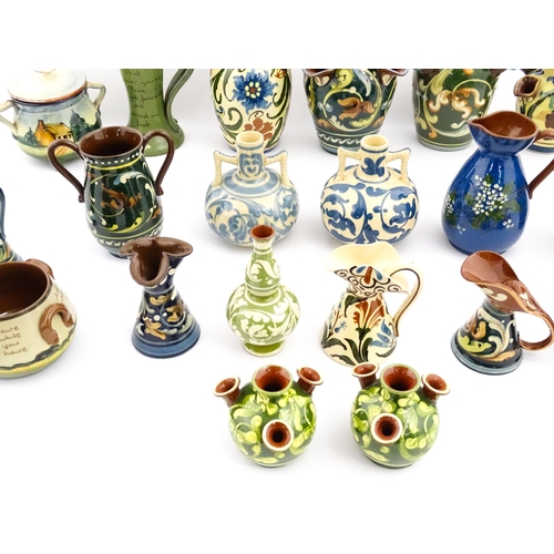 251 - A quantity of assorted Devon ceramics to include Allervale Pottery vases and jugs decorated with flo... 