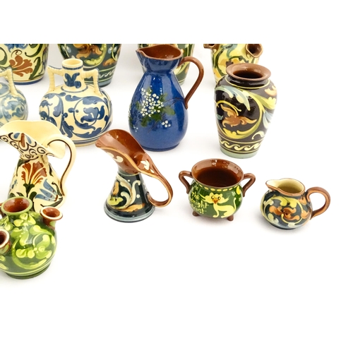 251 - A quantity of assorted Devon ceramics to include Allervale Pottery vases and jugs decorated with flo... 