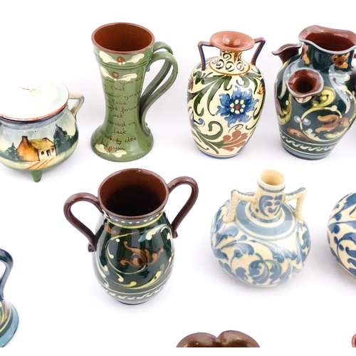 251 - A quantity of assorted Devon ceramics to include Allervale Pottery vases and jugs decorated with flo... 