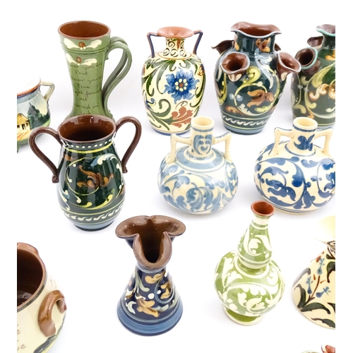 251 - A quantity of assorted Devon ceramics to include Allervale Pottery vases and jugs decorated with flo... 