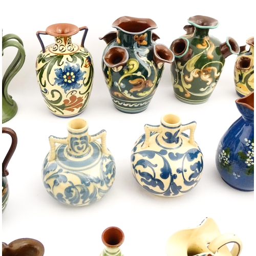 251 - A quantity of assorted Devon ceramics to include Allervale Pottery vases and jugs decorated with flo... 