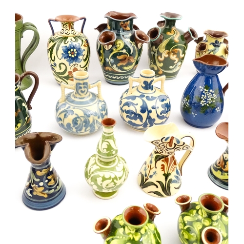 251 - A quantity of assorted Devon ceramics to include Allervale Pottery vases and jugs decorated with flo... 