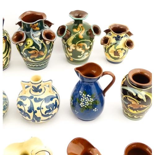 251 - A quantity of assorted Devon ceramics to include Allervale Pottery vases and jugs decorated with flo... 