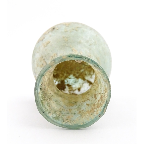 260 - A Roman glass flask with flared rim. Approx. 2