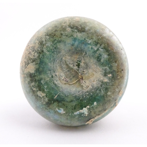 260 - A Roman glass flask with flared rim. Approx. 2