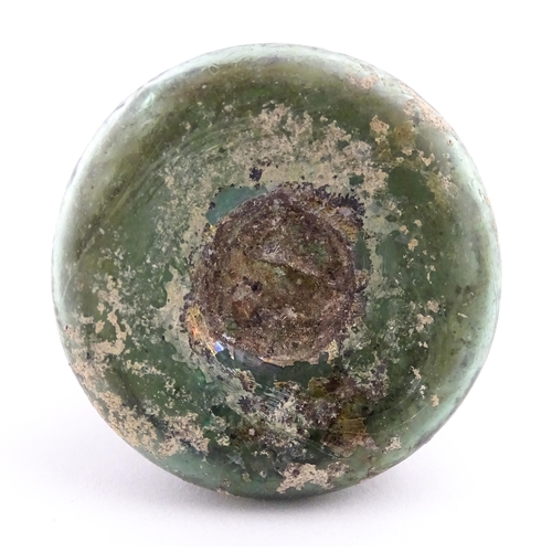 261 - A Roman glass flask with elongated neck and conical body. Approx. 2 3/4