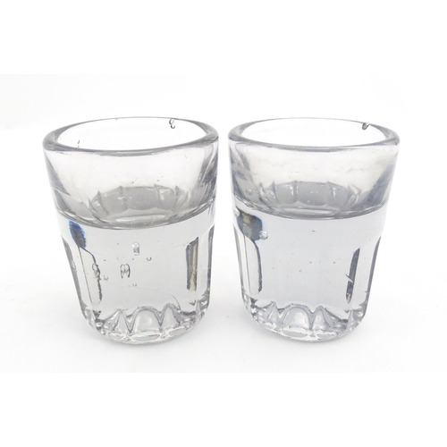 274 - Two illusion glasses of tumbler form. Approx. 4