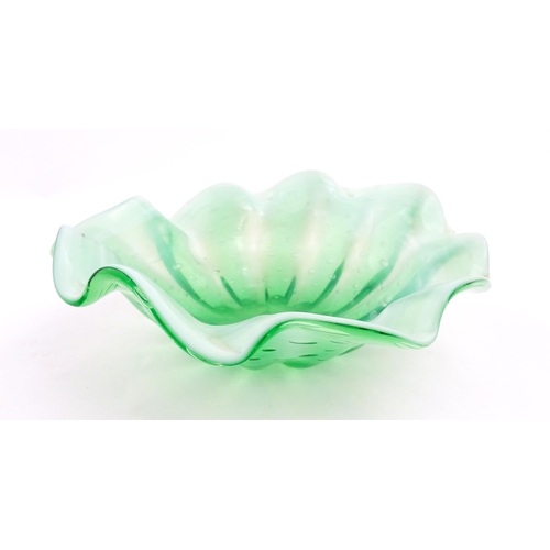 275 - A green and white art glass bowl with flared rim and controlled bubble detail. Approx. 9