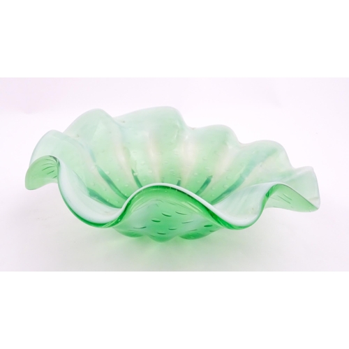 275 - A green and white art glass bowl with flared rim and controlled bubble detail. Approx. 9