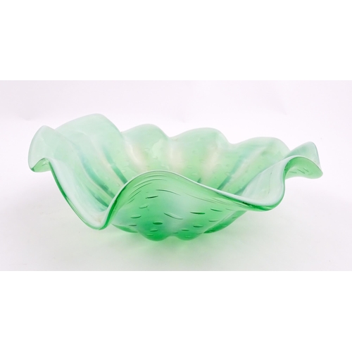 275 - A green and white art glass bowl with flared rim and controlled bubble detail. Approx. 9