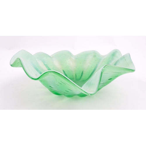 275 - A green and white art glass bowl with flared rim and controlled bubble detail. Approx. 9