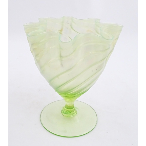 280 - A uranium glass pedestal vase with flared rim in the manner of John Walsh Walsh. Approx. 6