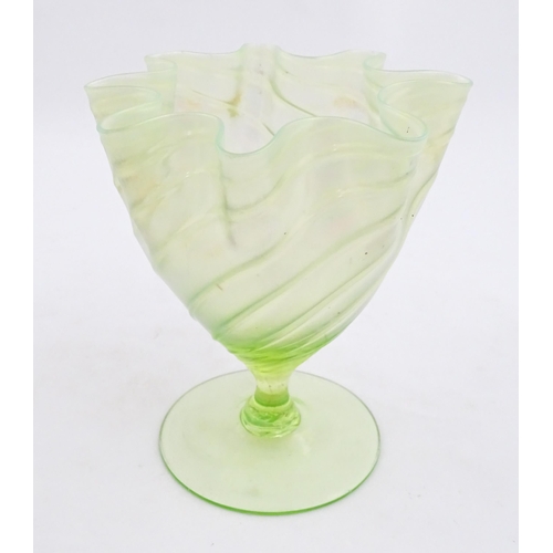 280 - A uranium glass pedestal vase with flared rim in the manner of John Walsh Walsh. Approx. 6