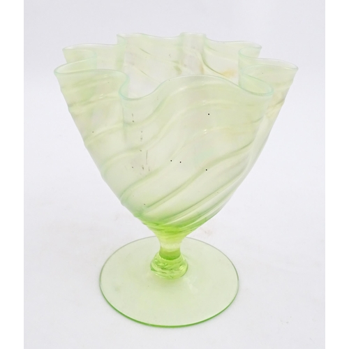 280 - A uranium glass pedestal vase with flared rim in the manner of John Walsh Walsh. Approx. 6